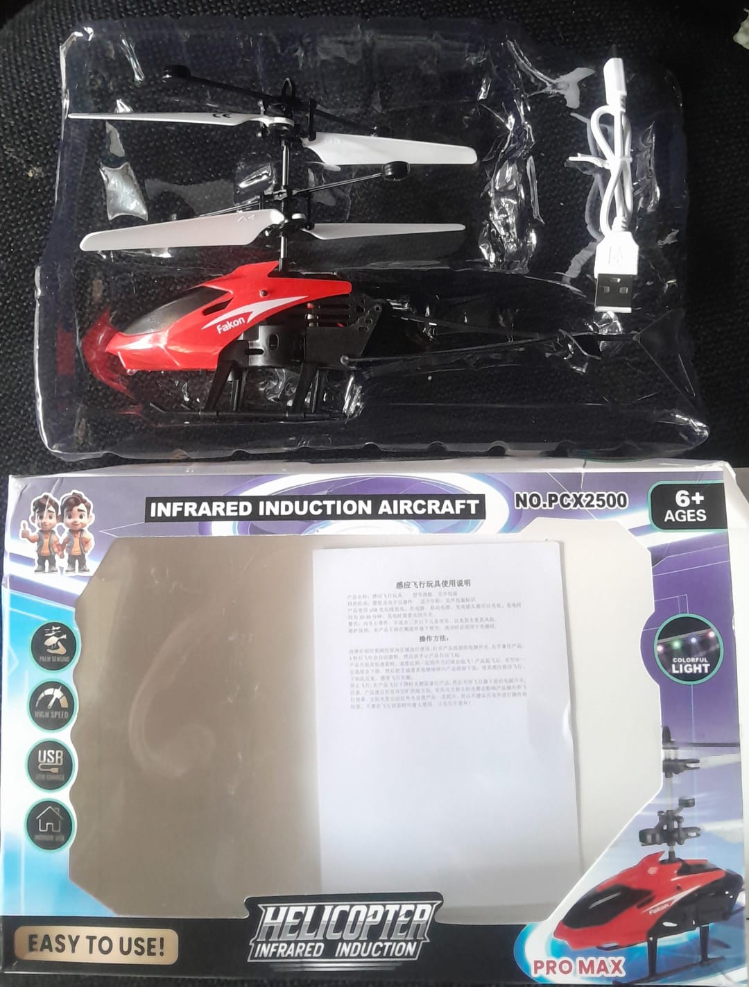 Helicoptero de induccion recargable. Hélice giratoria, luces LED. Vuela, se sostiene, incluye cable recarga.